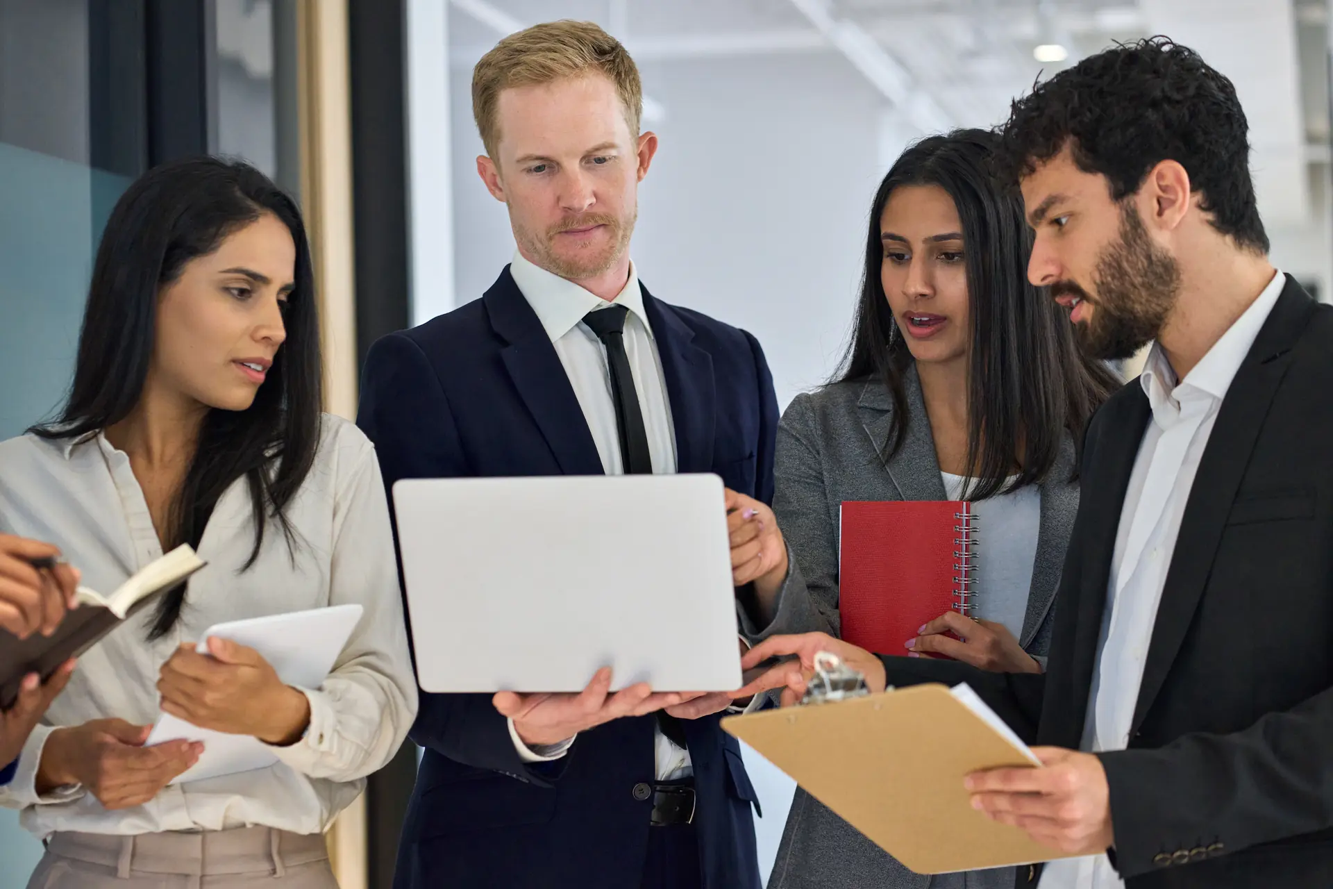 Professional business team standing in office
